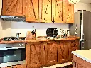 ELISE_Steinhaus_07_Kueche_Massivholz.webp